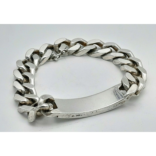 311 - A Chunky Sterling Silver Curb Identity Bracelet. If your name is Snowy - it's your lucky day! 22cm. ... 