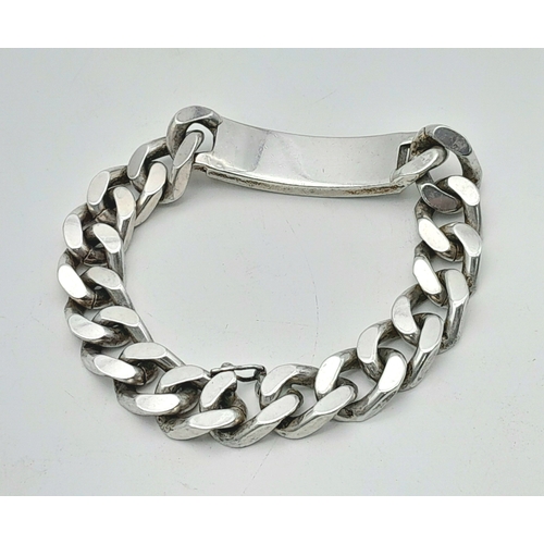 311 - A Chunky Sterling Silver Curb Identity Bracelet. If your name is Snowy - it's your lucky day! 22cm. ... 