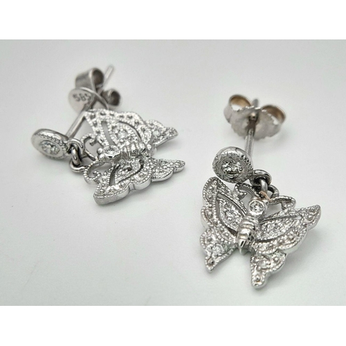 1139 - A Pair of Vintage 14K White Gold and Diamond Earrings in Butterfly Form. 2.2g