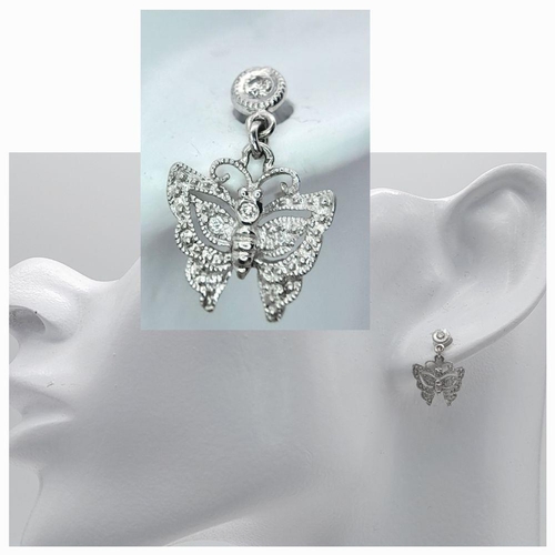 1139 - A Pair of Vintage 14K White Gold and Diamond Earrings in Butterfly Form. 2.2g