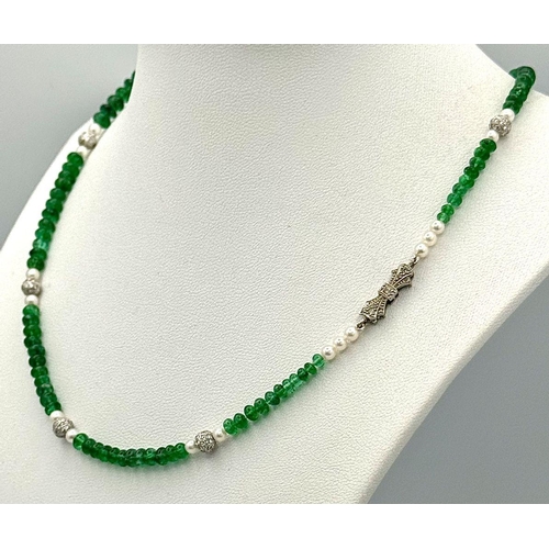 261 - An Emerald Small Rondelle Necklace with Seed Pearl and Diamond Glitterball Fancy Spacers. 18K gold a... 