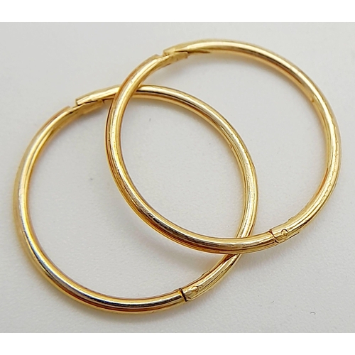 1554 - A PAIR OF 9K YELLOW GOLD MINI HOOP SLEEPER EARRINGS. 0.85G TOTAL WEIGHT. Ref: 6695