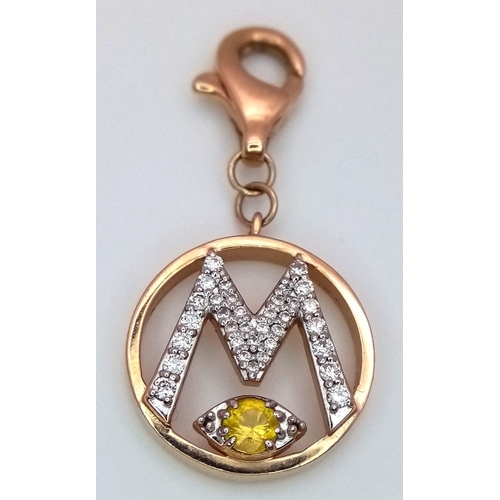 1148 - A 14K YELLOW GOLD DIAMOND SET INITIAL M CHARM 2.3G TOTAL WEIGHT, 2.8CM x 1.4CM. Ref: SC 8068