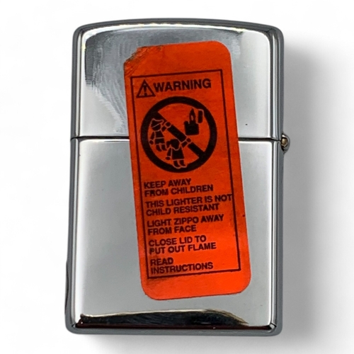 1142 - A rare vintage US Zippo Wild West Buffalo Head Lighter, comes with the original gold-tone metal tin.... 