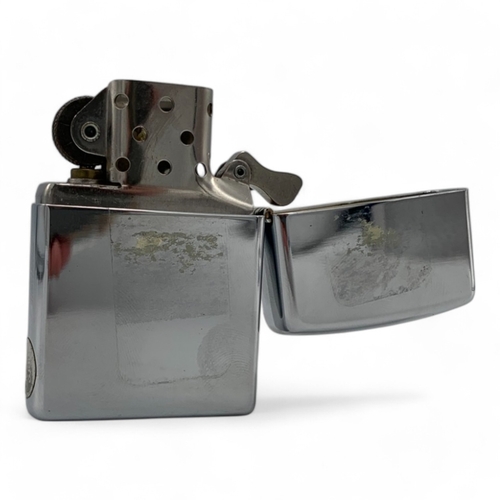 1142 - A rare vintage US Zippo Wild West Buffalo Head Lighter, comes with the original gold-tone metal tin.... 