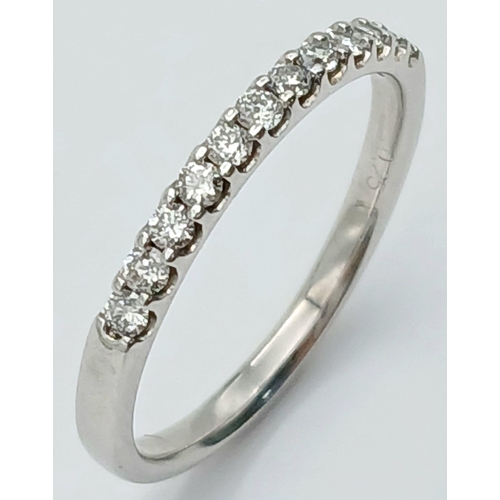 1218 - AN 18K WHITE GOLD DIAMOND BAND RING. 0.25CT. 2.3G IN WEIGHT. SIZE P. Ref: SC 1060