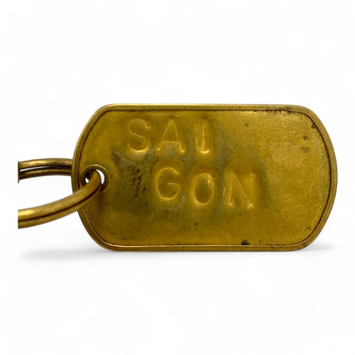 1338 - A Vietnam war era military themed Keychain, include a bullet charm, a pistol charm, a dog tag plate ... 