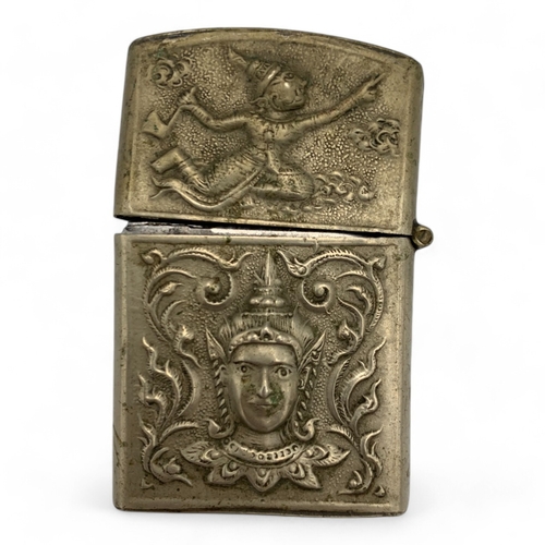 1345 - A Vintage Lighter with intricate engravings of Thai mythological figures and scenes.  Some signs of ... 