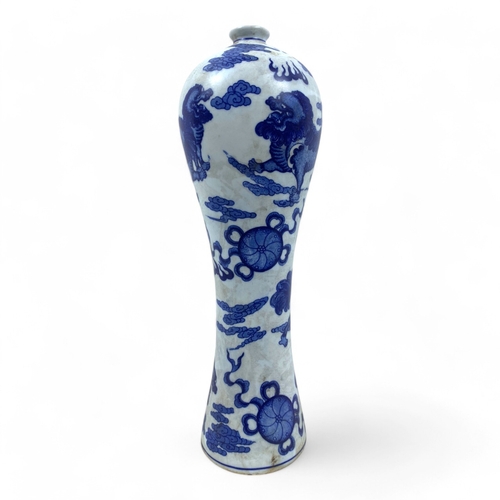 1044 - An antique Chinese Blue and White Porcelain Meiping Vase. Featuring mythical lions, cloud motifs, an... 