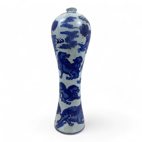 1044 - An antique Chinese Blue and White Porcelain Meiping Vase. Featuring mythical lions, cloud motifs, an... 