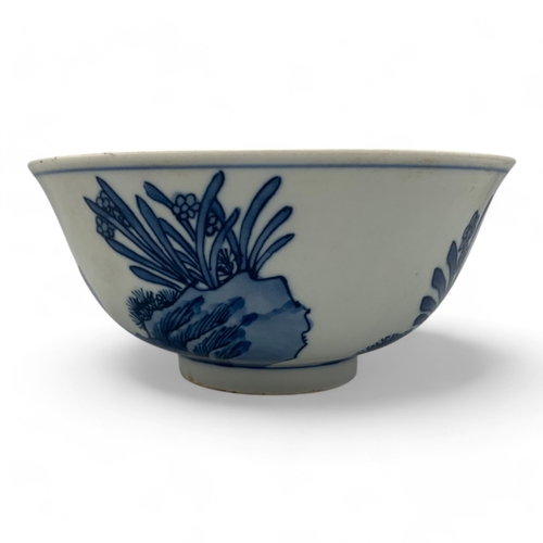 1058 - An antique Chinese Kangxi Blue and White Porcelain Bowl. Hand painted featuring bird and floral moti... 