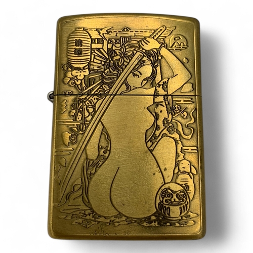 1467 - A vintage Zippo Japanese Geisha Engraved Lighter.
Brass exterior with erotic engraved artwork. Very ... 