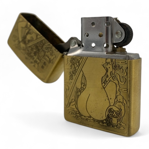 1467 - A vintage Zippo Japanese Geisha Engraved Lighter.
Brass exterior with erotic engraved artwork. Very ... 