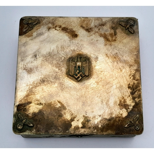 178 - A WW2 German Patriotic Tin with an Eastern Front Medal Inside.