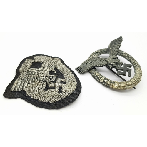 18 - A WW2 Luftwaffe Pilots qualification badges in metal and cloth. The metal pilots badge bears the Mak... 