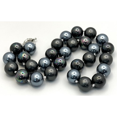 428 - A South Sea Dark Grey and Blue Metallic Pearl Shell Necklace. Large 14mm beads. 42cm length