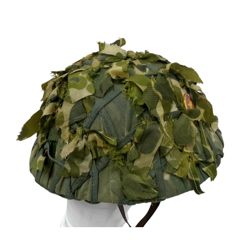 500 - A Vietnam War Era North Vietnamese M60 Fibre Helmet and liner with Rainy Season Cam Cover.