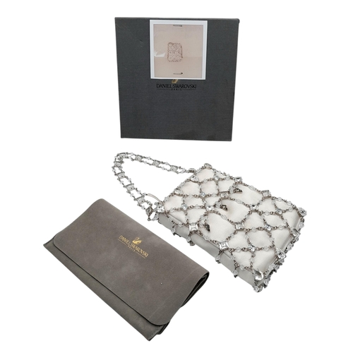 566 - A Swarovski Decorative Crystal Evening Bag. 17cm x 11cm. Comes with original packaging. Ref: 18534