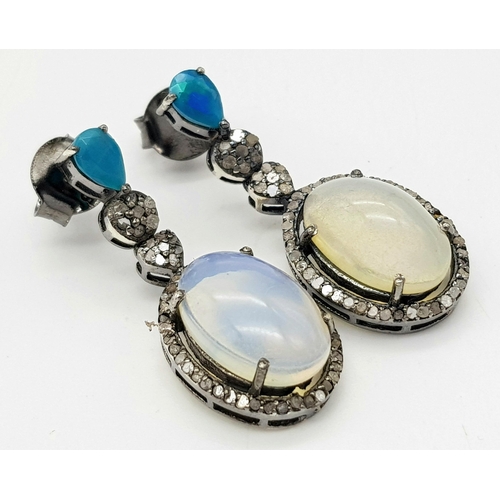 575 - A Pair of Moonstone Earrings with Diamond and Opal Accents. Set in 925 Silver. Moonstones - 6ctw. Ol... 