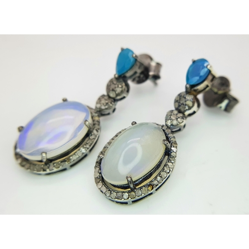 575 - A Pair of Moonstone Earrings with Diamond and Opal Accents. Set in 925 Silver. Moonstones - 6ctw. Ol... 