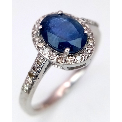 631 - A 1.5ct Oval Blue Sapphire Ring with 0.3ctw of Diamond Accents. Set in 925 Silver. Size N. CD-1685