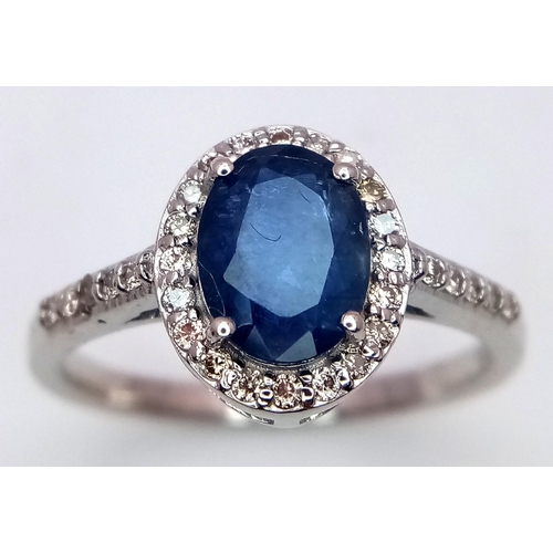 631 - A 1.5ct Oval Blue Sapphire Ring with 0.3ctw of Diamond Accents. Set in 925 Silver. Size N. CD-1685