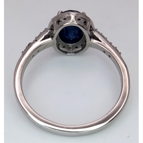 631 - A 1.5ct Oval Blue Sapphire Ring with 0.3ctw of Diamond Accents. Set in 925 Silver. Size N. CD-1685