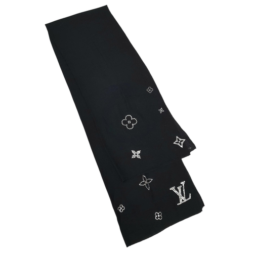 643 - Two Louis Vuitton Scarves. One is black soft cashmere features crystal embellishments forming Louis ... 