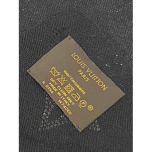 643 - Two Louis Vuitton Scarves. One is black soft cashmere features crystal embellishments forming Louis ... 