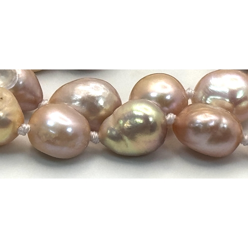 736 - A Lavender Small Baroque Freshwater Pearl Necklace. 42cm.