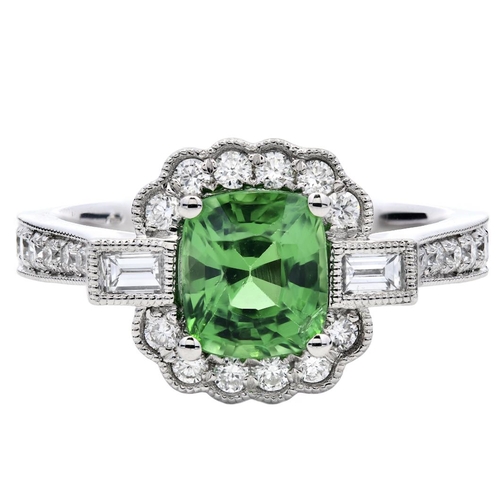 1201 - A PLATINUM CLUSTER RING FEATURING A 1.28CT CUSHION TSAVORITE AND 0.47CT ROUND AND BAGUETTE DIAMONDS,... 