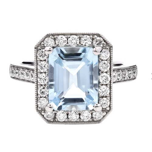 1208 - A PLATINUM HALO RING FEATURING A 2.02CT EMERALD CUT AQUAMARINE CENTER STONE, SURROUNDED BY 0.57CT OF... 