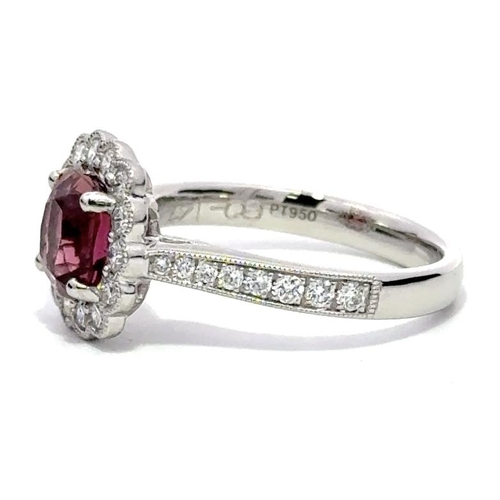 1215 - A PLATINUM HALO RING FEATURING A 1.47CT CUSHION PINK TOURMALINE AND 0.60CT ROUND DIAMONDS IN A CLAW ... 