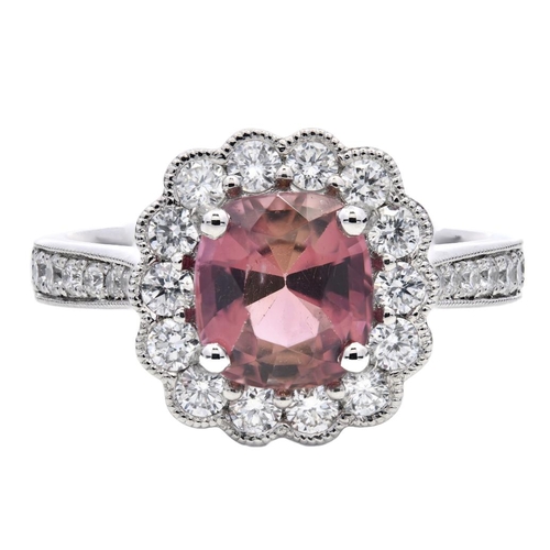 1215 - A PLATINUM HALO RING FEATURING A 1.47CT CUSHION PINK TOURMALINE AND 0.60CT ROUND DIAMONDS IN A CLAW ... 