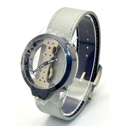 1199 - A Verticale Mechanical Top Winder Gents Watch. Blue leather strap. Ceramic blue skeleton case - 42mm... 