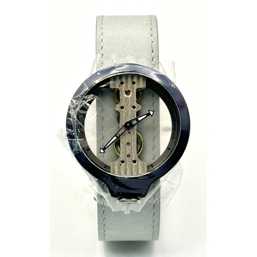 1199 - A Verticale Mechanical Top Winder Gents Watch. Blue leather strap. Ceramic blue skeleton case - 42mm... 