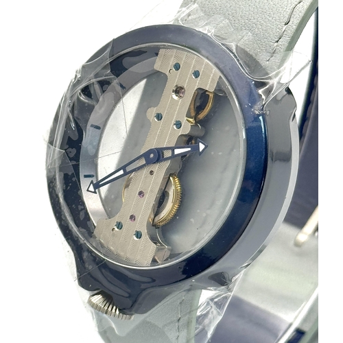 1199 - A Verticale Mechanical Top Winder Gents Watch. Blue leather strap. Ceramic blue skeleton case - 42mm... 