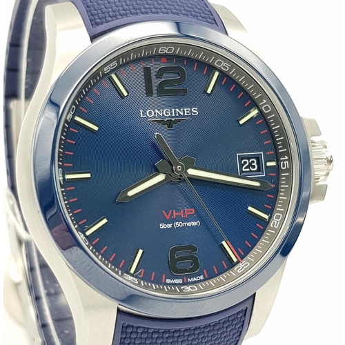 310 - A Longine Conquest V.H.P. Quartz Gents Watch. Blue rubber strap. Stainless steel case - 42mm. Blue d... 