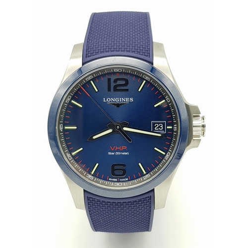 310 - A Longine Conquest V.H.P. Quartz Gents Watch. Blue rubber strap. Stainless steel case - 42mm. Blue d... 