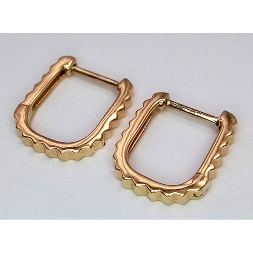 50 - A Pair of Messika 14K Gold and Diamond Earrings. 1.4g total weight.