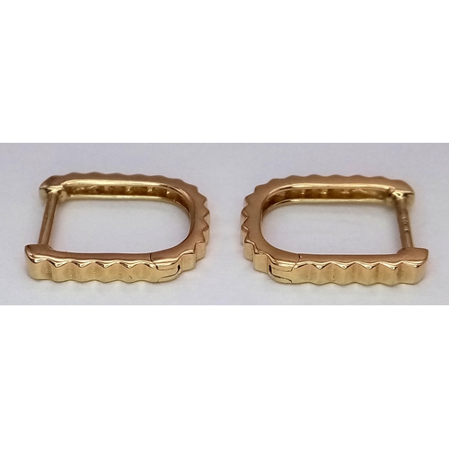 50 - A Pair of Messika 14K Gold and Diamond Earrings. 1.4g total weight.