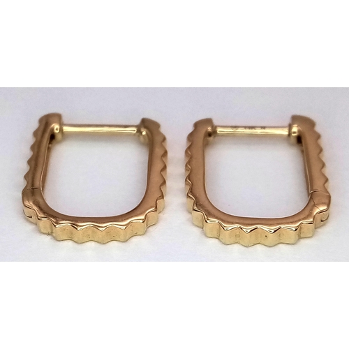 50 - A Pair of Messika 14K Gold and Diamond Earrings. 1.4g total weight.