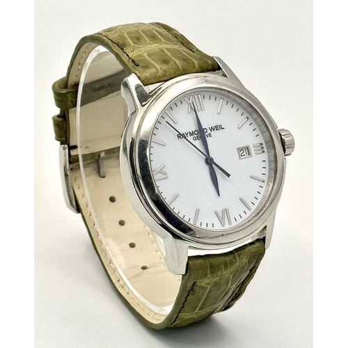 745 - A Raymond Weil Geneve Quartz Gents Watch. Green leather strap. Stainless steel case - 44mm. White di... 