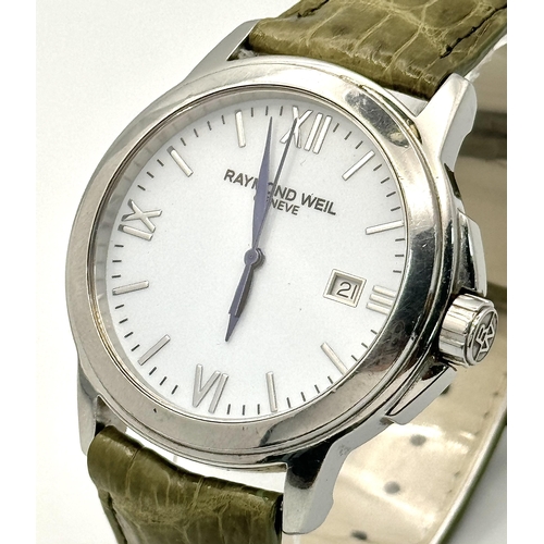 745 - A Raymond Weil Geneve Quartz Gents Watch. Green leather strap. Stainless steel case - 44mm. White di... 