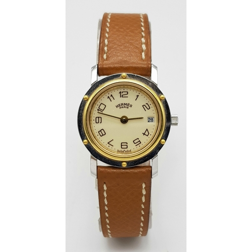 85 - An Hermes of Paris Quartz Ladies Watch. Brown leather strap. Two tone stainless steel case - 25mm. C... 