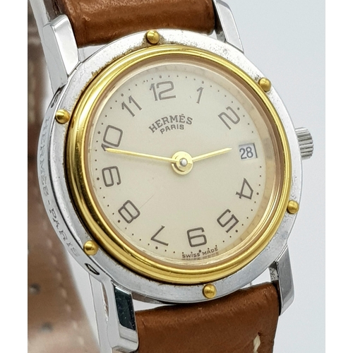 85 - An Hermes of Paris Quartz Ladies Watch. Brown leather strap. Two tone stainless steel case - 25mm. C... 