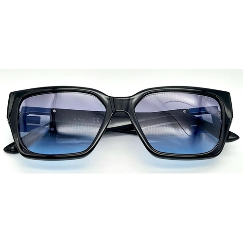 1480 - A Pair of Designer Guess Sunglasses.