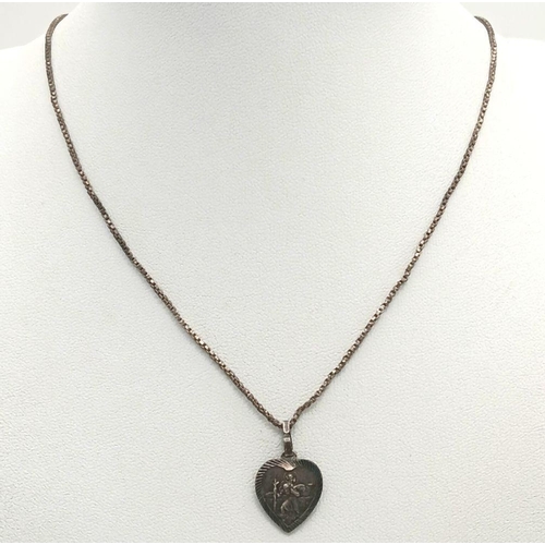 1550 - A vintage sterling silver St Christopher Heart pendant on silver box chain. Total weight 5.2G. Total... 