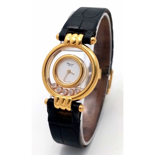 184 - A Chopard Happy Diamonds 18K Gold Quartz Ladies Watch. Black leather strap. 18K gold case - 26mm. Wh... 