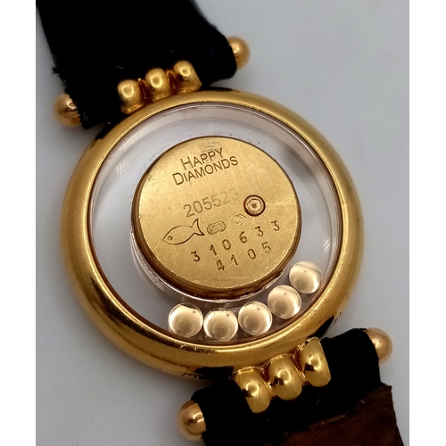 184 - A Chopard Happy Diamonds 18K Gold Quartz Ladies Watch. Black leather strap. 18K gold case - 26mm. Wh... 